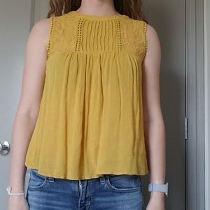 Mustard yellow baby doll top.